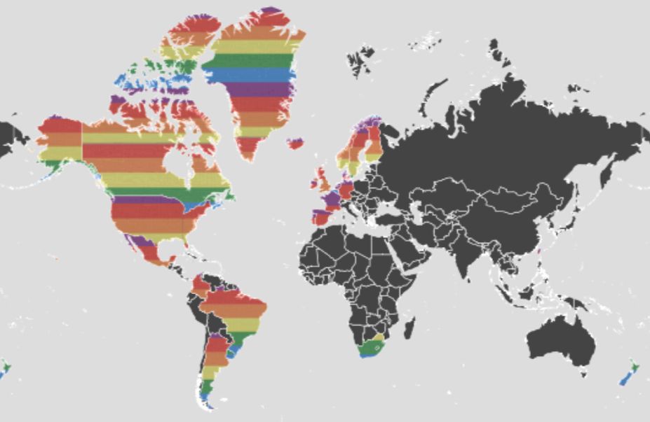 A world map depicting different countries in various colors, with North and South America prominently displayed in multicolored stripes, and Africa, Europe, and parts of Asia in grey scale. The map illustrates the diversity and division of territories without specific identification marks.