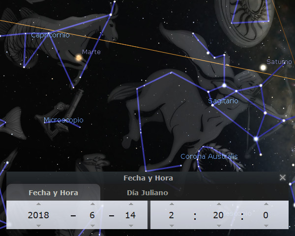 Imagen que muestra una representación visual de constelaciones y planetas en el espacio. Se observan figuras que corresponden a constelaciones conectadas por líneas azules, acompañadas de nombres como Capricornio y Sagitario, junto a los planetas Marte y Saturno. Un panel en la parte inferior muestra la fecha y hora exacta del 14 de junio de 2018 a las 20:00.
