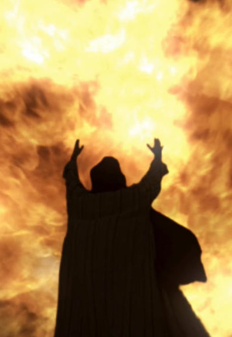 Silhouette of a person with arms raised towards a vibrant celestial display resembling flames in the sky, evoking themes of awe and the grandeur of creation.