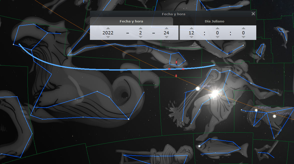 Vista de un software de simulación astronómica mostrando una representación artística de constelaciones y cuerpos celestes con etiquetas en español que identifican planetas como Mercurio, Saturno y Júpiter. El fondo es oscuro y las figuras y constelaciones están destacadas con líneas azules. También se muestra una interfaz con ajustes de fecha y hora.
