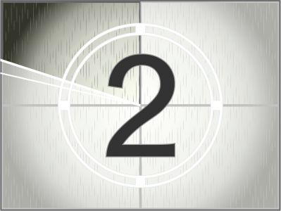 A graphic depiction featuring the number 2 within a white circle, set against a textured gray background with subtle vertical lines. A thin white arc intersects the circle.