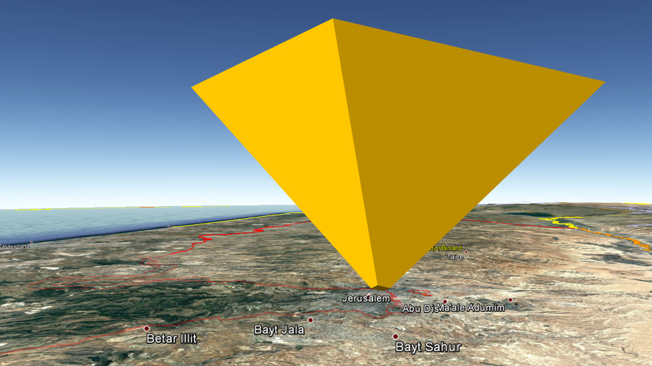 A large, yellow geometric shape resembling a tetrahedron hovering over a satellite map view of the Middle East region, prominently featuring Jerusalem and surrounding areas like Betar Illit and Bayt Jala. The landscape below is a mix of terrain textures illustrating topographical variations.