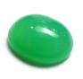 A green circular object, resembling a polished gemstone with a glossy surface, set against a glitched multicolored background.