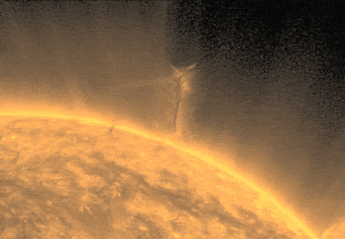 An animated close-up view of the sun's surface showing a bright, dynamic solar flare arching outward, set against the backdrop of the dark cosmos.