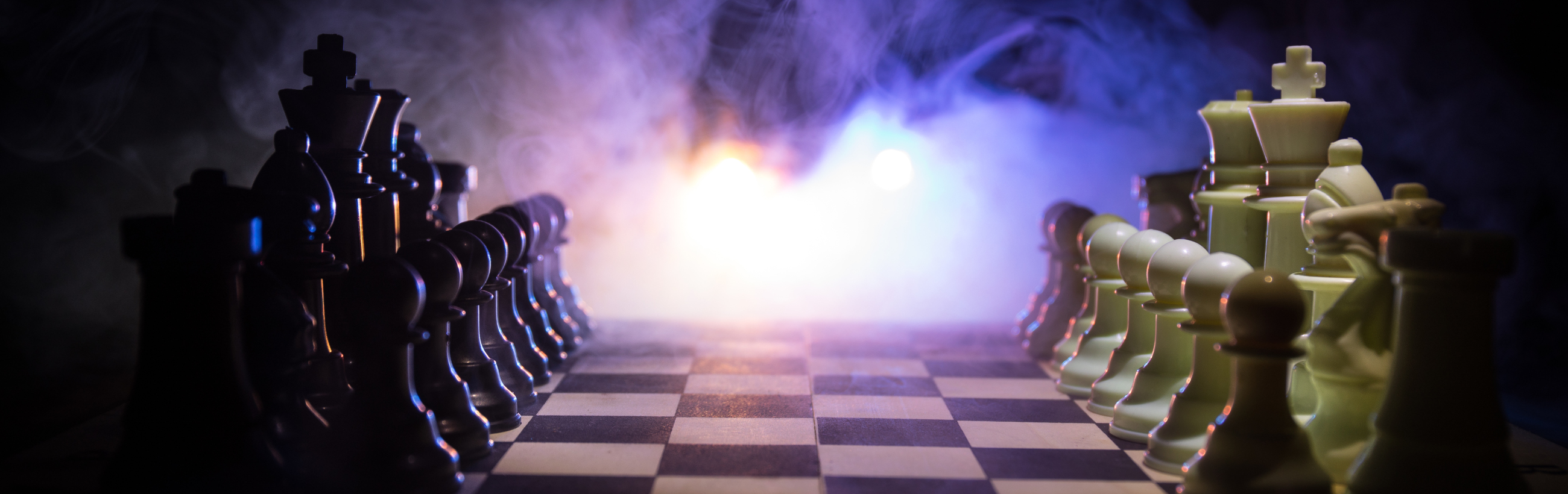 A chessboard illuminated by a celestial glow, with dark and light chess pieces arrayed as if under a heavenly light, evoking the majestic expanse of the celestial realm.