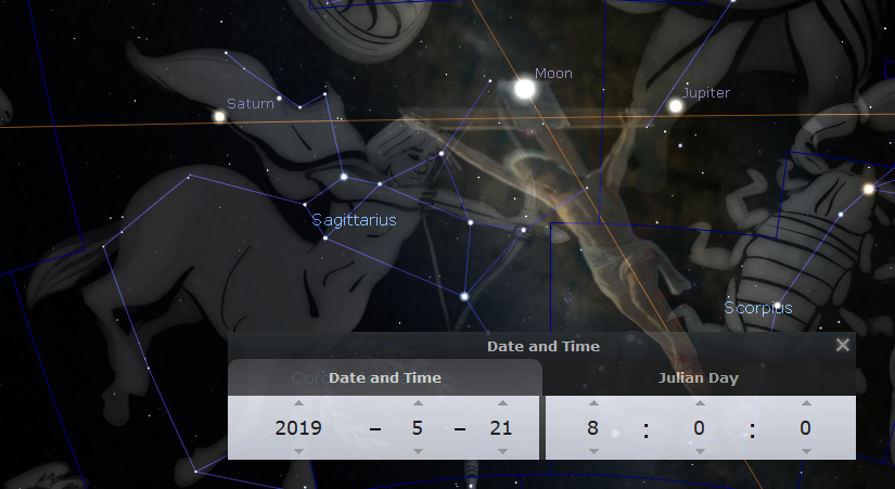 A digital illustration depicting a celestial scene with detailed star patterns associated with the Mazzaroth, highlighting configurations that correlate with specific cosmic bodies including Saturn, the Moon, and Jupiter. The image features an overlay of grid lines and labels, with a control panel indicating the date as May 21, 2019, and a Julian Day value. The scene effectively conveys the positions and alignments of celestial entities as observed from Earth on the specified date.