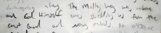 Close-up of a handwritten note on a white background, mentioning celestial entities including the Milky Way.