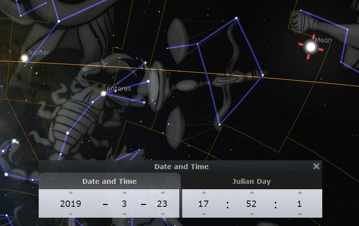 A digital astronomical simulation showing labeled celestial bodies including Jupiter and Antares. The depiction includes representations from the Mazzaroth with connected lines forming intricate shapes, alongside the Moon in the night sky. A user interface at the bottom displays the date and Julian Day for March 23, 2019.