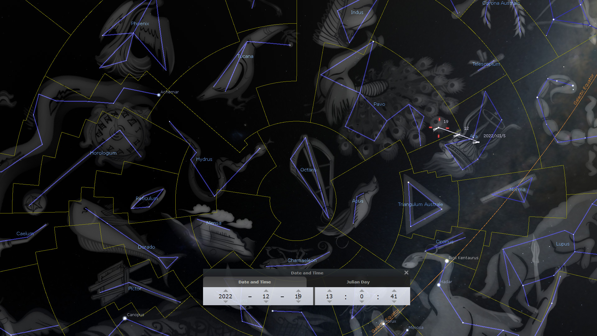 An intricate celestial map displaying various celestial constellations overlaid on a dark background. Labels such as Phoenix, Indus, Pavo, and Tucana are visible, along with lines and shapes connecting the stars to form distinct patterns. A date and time overlay shows "2022 - 12 - 19, 0:41", and a notation of 'Julian Day'.