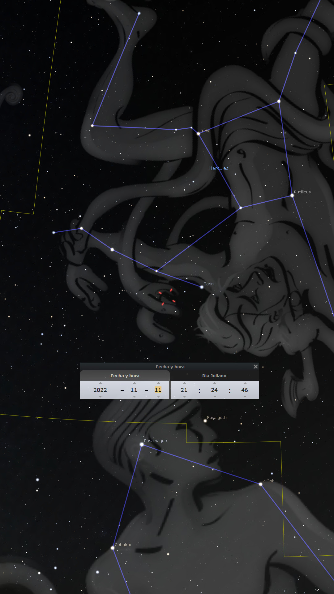 Imagen digital de constelaciones en un fondo estelar, representando figuras mitológicas con líneas conectando estrellas visibles. Se incluyen nombres de estrellas como Rasalhague y detalles como fechas y coordenadas astronómicas.